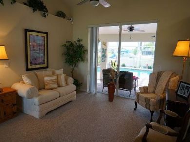 Living Area with Doors to Pool